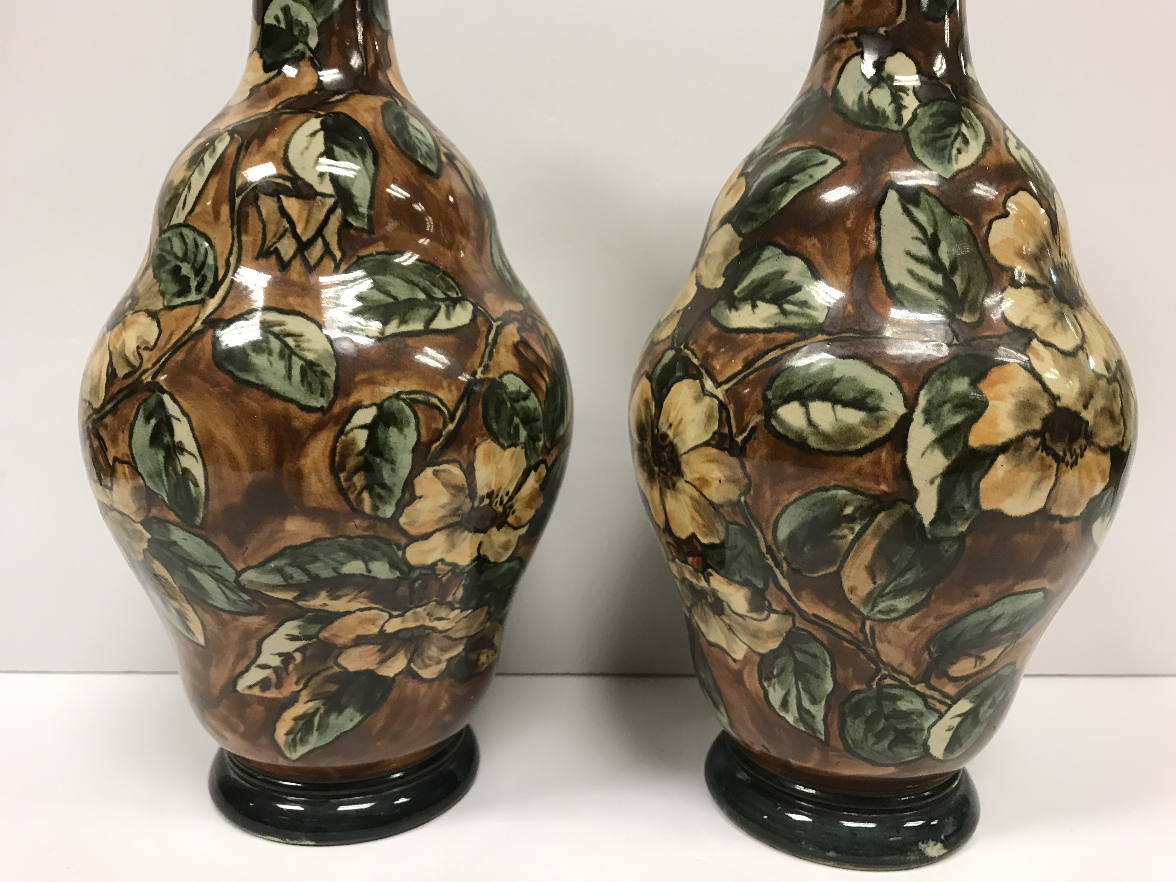 A pair of Doulton Lambeth faience ware vases, the brown ground set with floral decoration, - Image 7 of 22