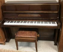 A modern mahogany cased upright piano,