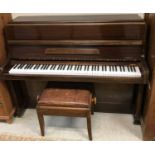 A modern mahogany cased upright piano,