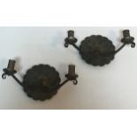 A pair of wrought iron Cotswold School twin branch wall lights,