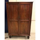 A 19th Century mahogany wardrobe,