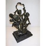 AFTER C PETRE "Three dancing putti", a patinated bronze study on white veined black marble base,