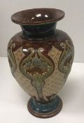 An Eliza Simmance Doulton Lambeth baluster shaped vase with relief work floral decoration and