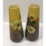 A pair of Burmantofts faience conical vases with floral decoration No'd 1559 to base 31 cm high