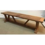 An elm refectory style kitchen table on plank,