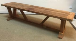 An elm refectory style kitchen table on plank,