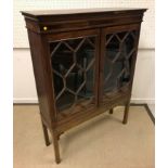 A 19th Century North Country oak and inlaid bookcase cabinet,