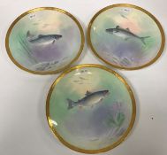 A set of three Minton fish decorated plates manufactured for Chicago Spalding & Co.