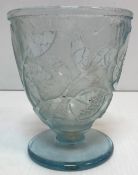 A Daume Nancy cut glass vase depicting stylised flowers, raised on a circular pedestal foot,