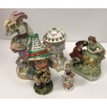 A Meissen figure of a girl with bird cage on her shoulder, letter to her hand and sheep at her feet,