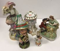 A Meissen figure of a girl with bird cage on her shoulder, letter to her hand and sheep at her feet,