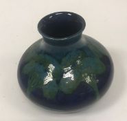 A Moorcroft "Moonlit" blue ground vase 10.