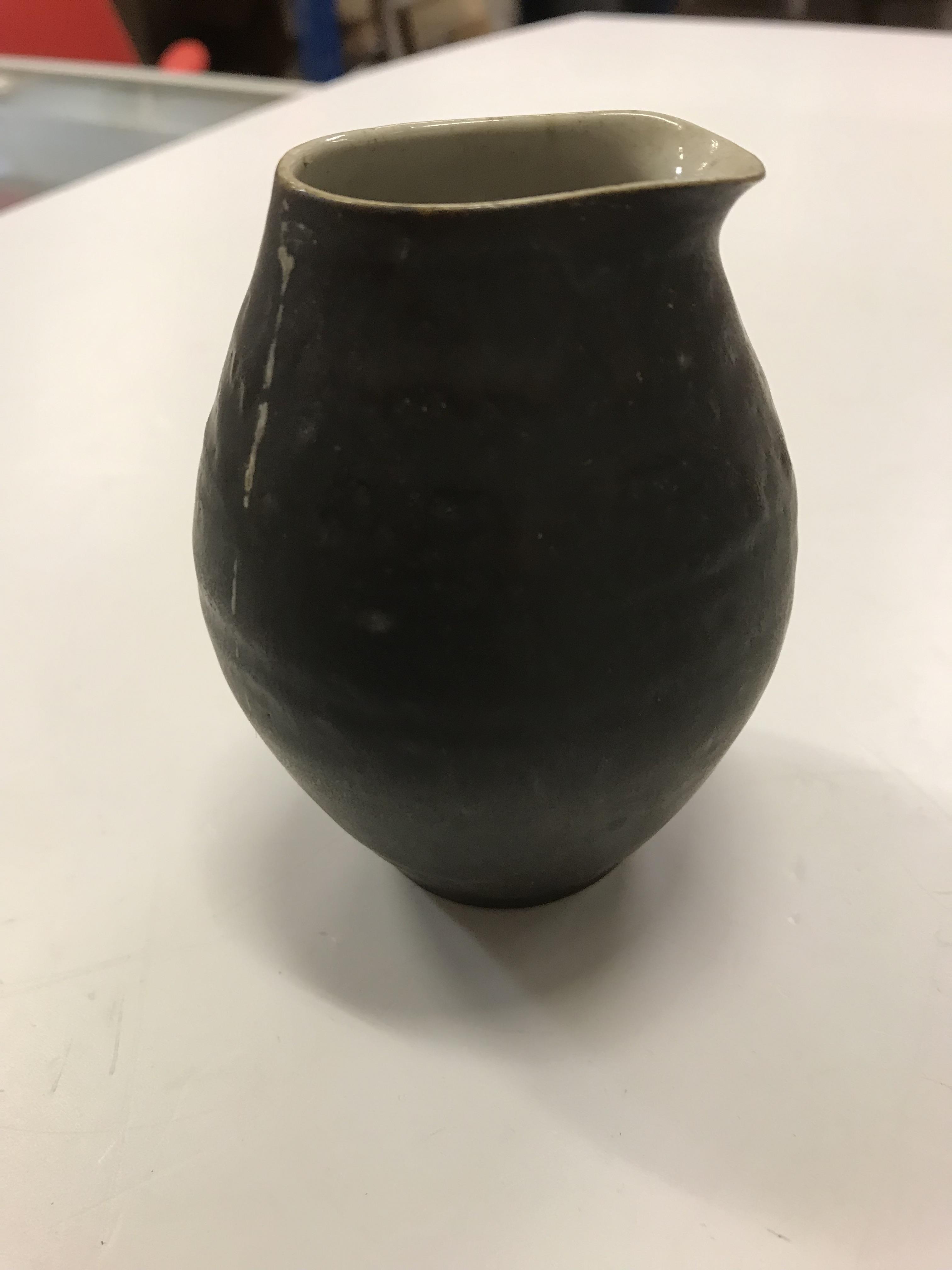 A Lucie Rie pouring vessel, with black glazed exterior and simple design, - Image 6 of 12
