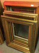 Four various gilt picture frames and four pine frames