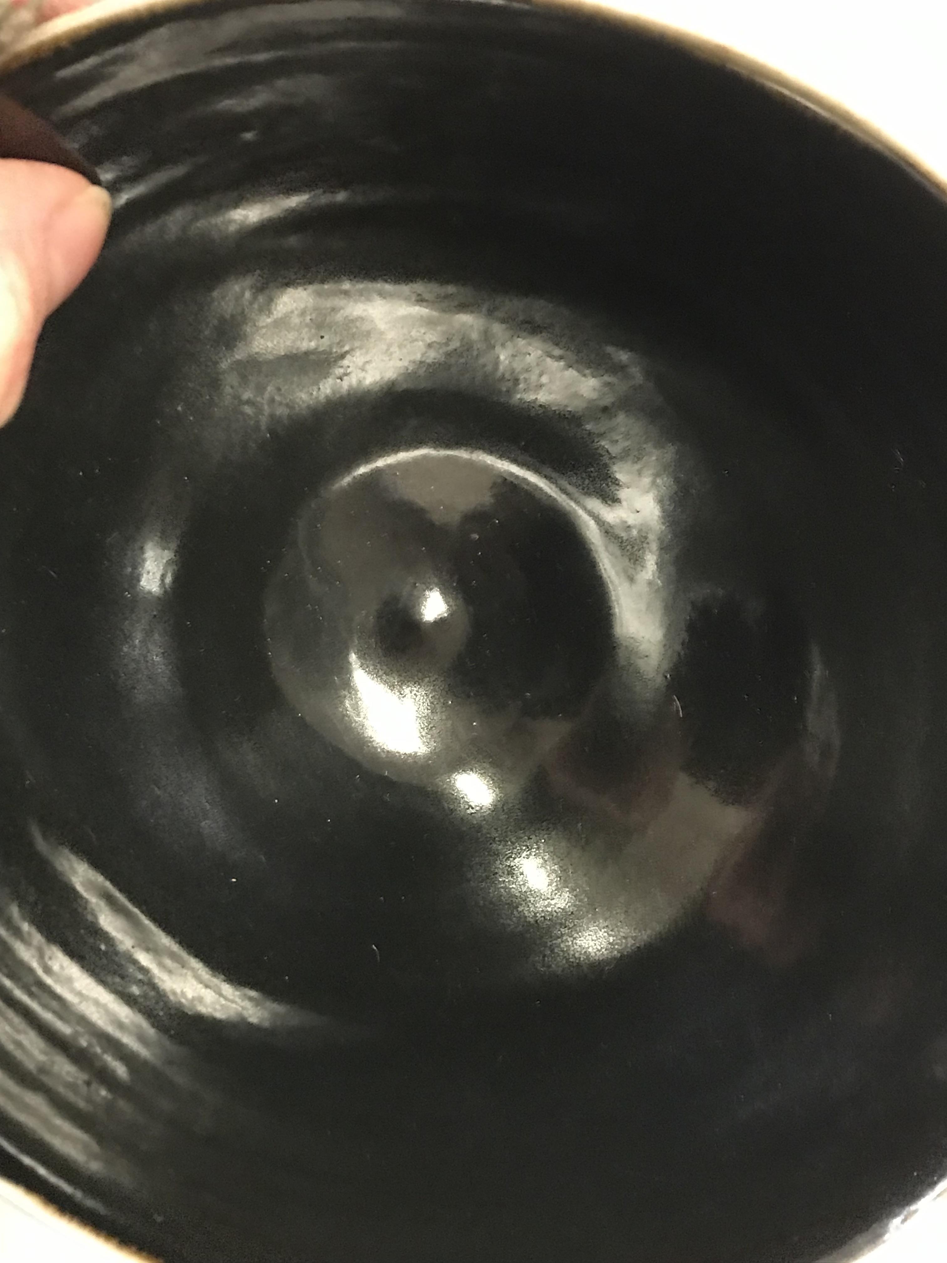 A Lucie Rie black glazed elliptical bowl and saucer, both bearing Lucie Rie marks, - Image 9 of 13