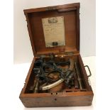 A mahogany cased J Coombes sextant inscribed "J Coombes Optician and Instrument Maker Devonport",