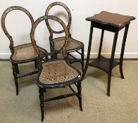 A set of three Victorian balloon back black lacquered and faux tortoiseshell decorated cane seated