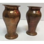 A pair of Richard Rathbone hammered copper baluster shaped vases with flared rims,