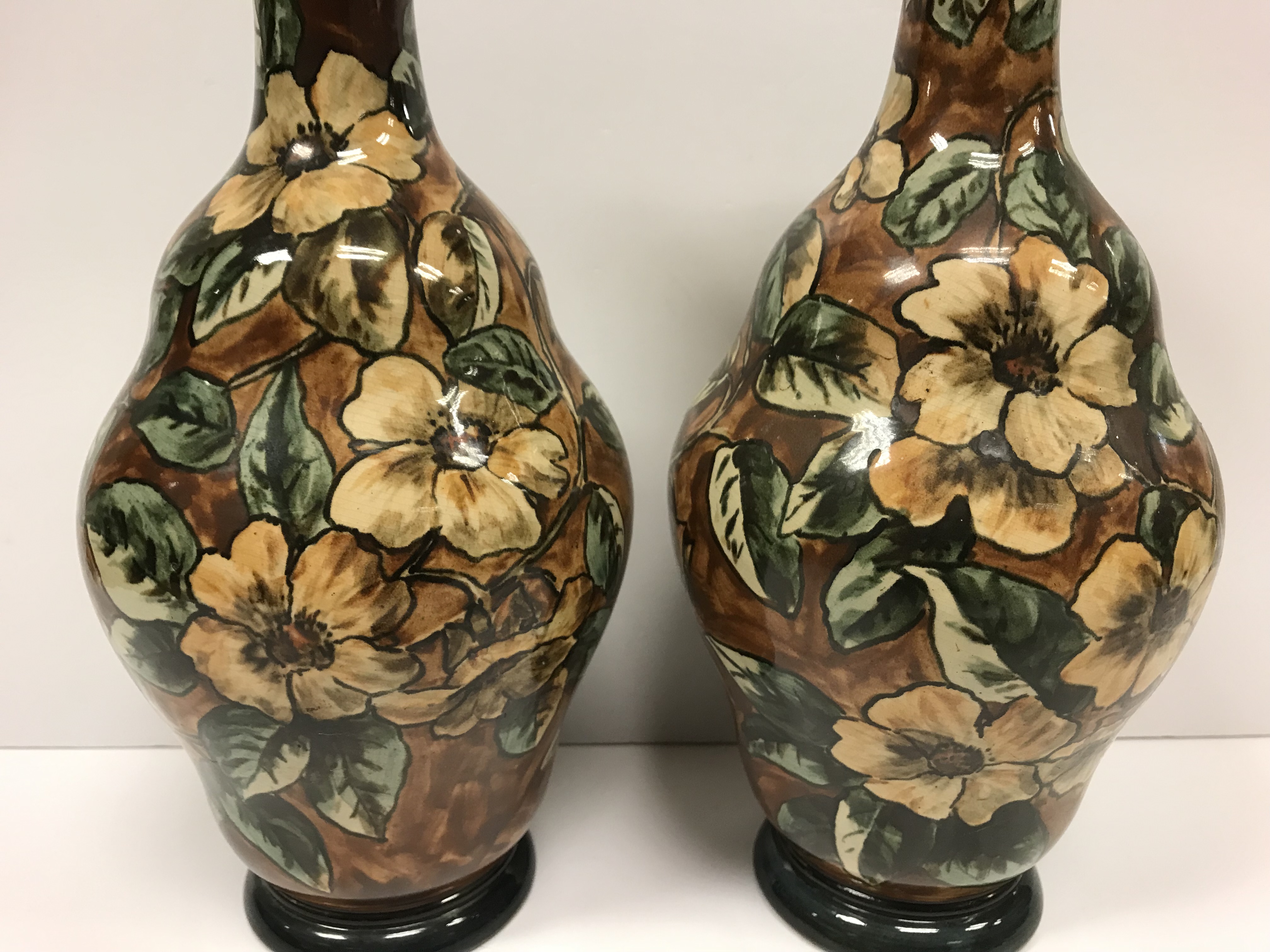 A pair of Doulton Lambeth faience ware vases, the brown ground set with floral decoration, - Image 4 of 22