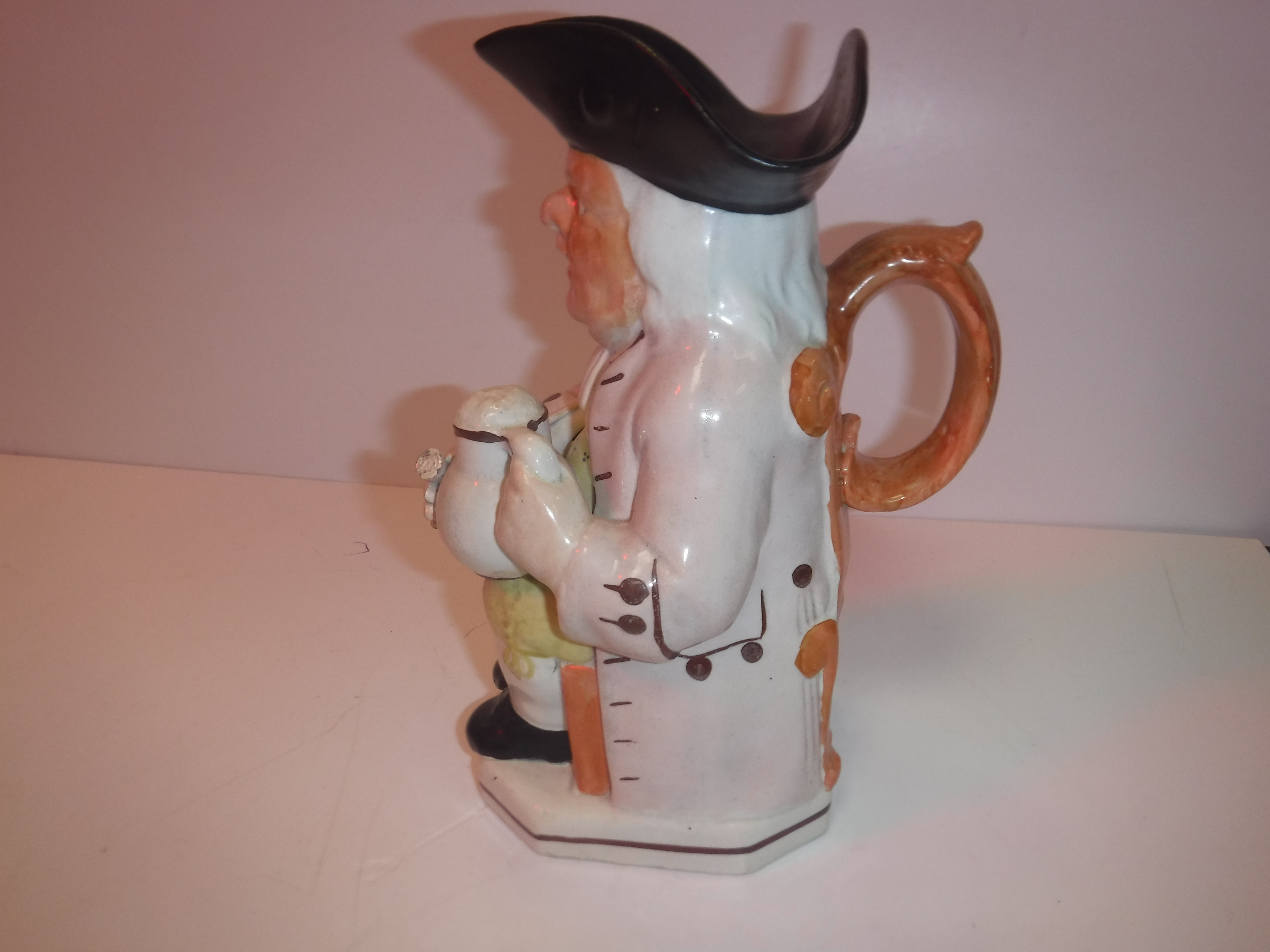 A 19th Century Staffordshire pottery Toby jug as "Toby Philpott seated with jug of ale on his left - Image 5 of 16