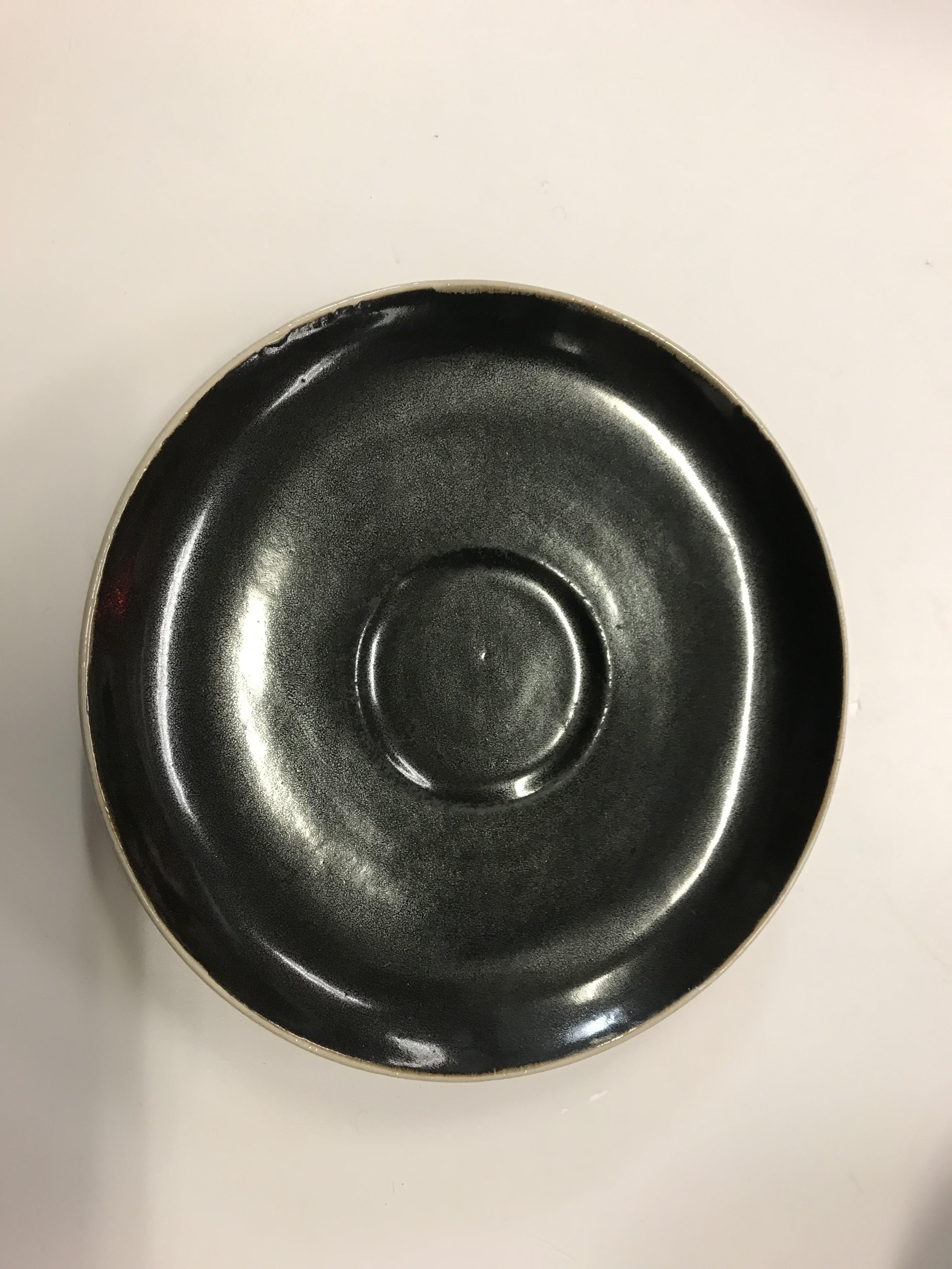 A Lucie Rie black glazed elliptical bowl and saucer, both bearing Lucie Rie marks, - Image 11 of 13