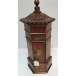 A treenware Victorian style country house letter box of hexagonal form with acanthus carved