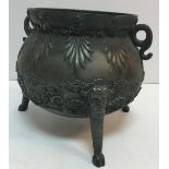 A 19th Century Italian cast bell metal twin-handled jardinier of cauldron form with cast C scroll,