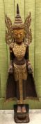 A Shan State Tibetan carved and gilded wooden standing Buddha with hands held outright on a lotus