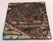 A mid 20th Century Devica-Viana Do Castel Portugal hot stones tile with stylised relief decoration