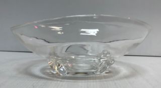 A Steuben glass oval shaped fruit bowl on foliate style supports,