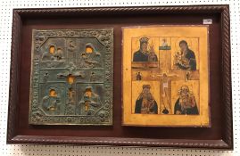 A 19th Century Russian icon depicting the Virgin and Christ Child in panels surrounding a crucifix,
