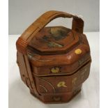 A South East Asian cane work and gilded wooden food container of octagonal form,