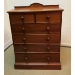 A modern mahogany chest of two short over four long drawers in the Victorian manner 93 cm wide x 43.