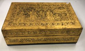 A Burmese gilded and black lacquered rectangular box,
