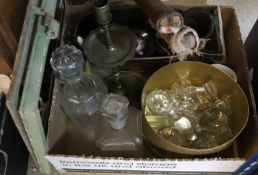 A box containing assorted sundry items to include a collection of glass bottle stoppers,