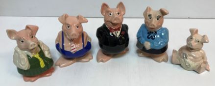 Two sets of five Wade Natwest piggy banks,