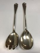 A pair of Edwardian “Old English” pattern silver salad servers (by Herbert Edward Barker and Frank