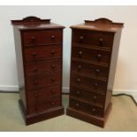 A pair of modern mahogany slim chests of six drawers in the Victorian taste 51 cm wide x 43.