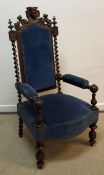 A circa 1900 Continental oak throne type hall chair,