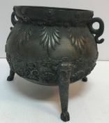 A 19th Century Italian cast bell metal twin-handled jardinier of cauldron form with cast C scroll,