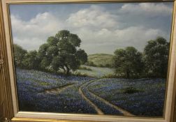 MARY HARRIS "Wooded landscape with blue flowers", oil on canvas, signed and dated 1987 lower left,
