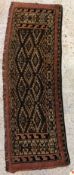 A Bokhara rug, the central panel set with repeating diamond medallions,