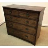 A 19th Century mahogany square front chest of two short over three long graduated drawers on