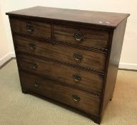 A 19th Century mahogany square front chest of two short over three long graduated drawers on