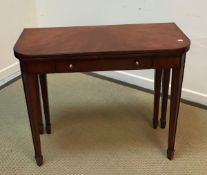 A Multiyork cherry wood fold over tea table in the Georgian style with single frieze drawer raised