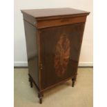 A mahogany and inlaid side cabinet,