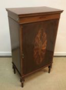 A mahogany and inlaid side cabinet,