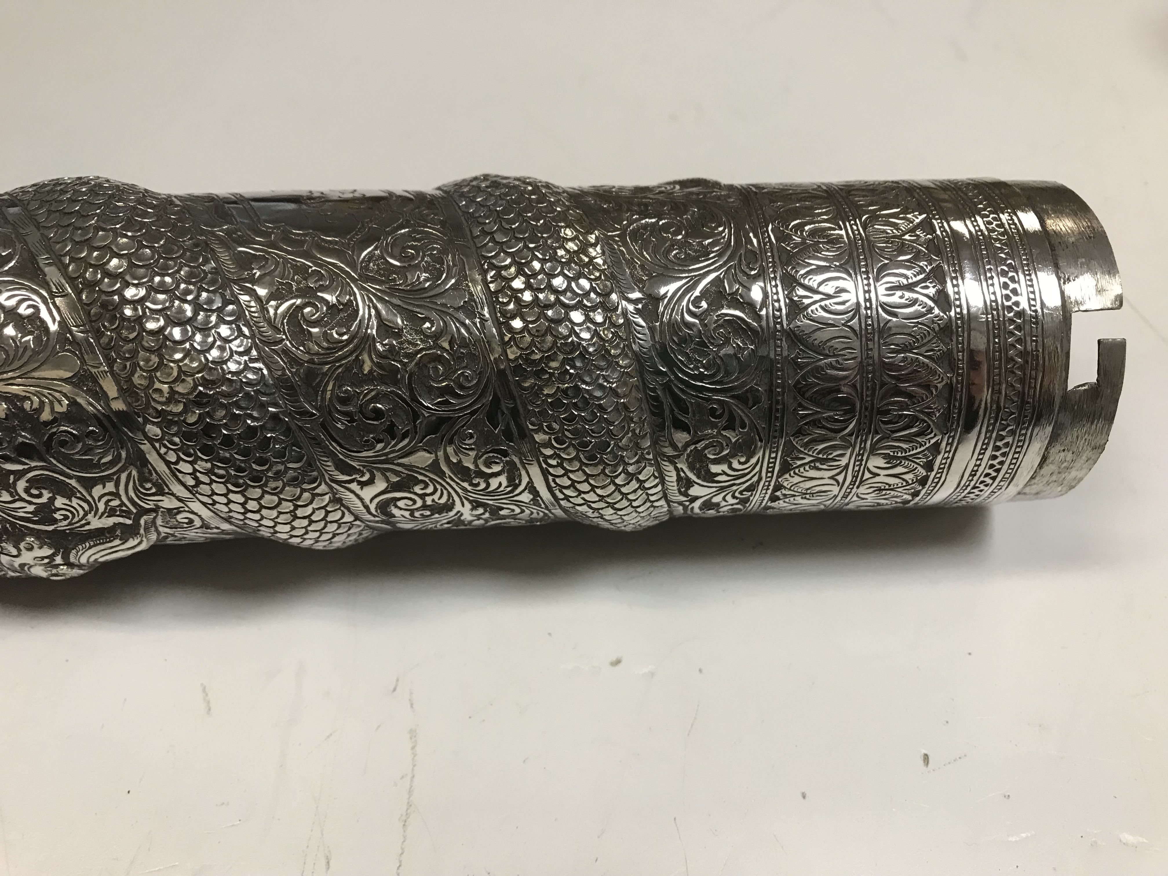 A Burmese silver document or manuscript holder with foliate and relief work serpent decoration and - Image 9 of 21