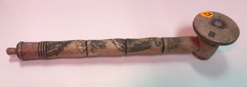 A carved soapstone opium pipe decorated with phoenix with various inscriptions / signatures to