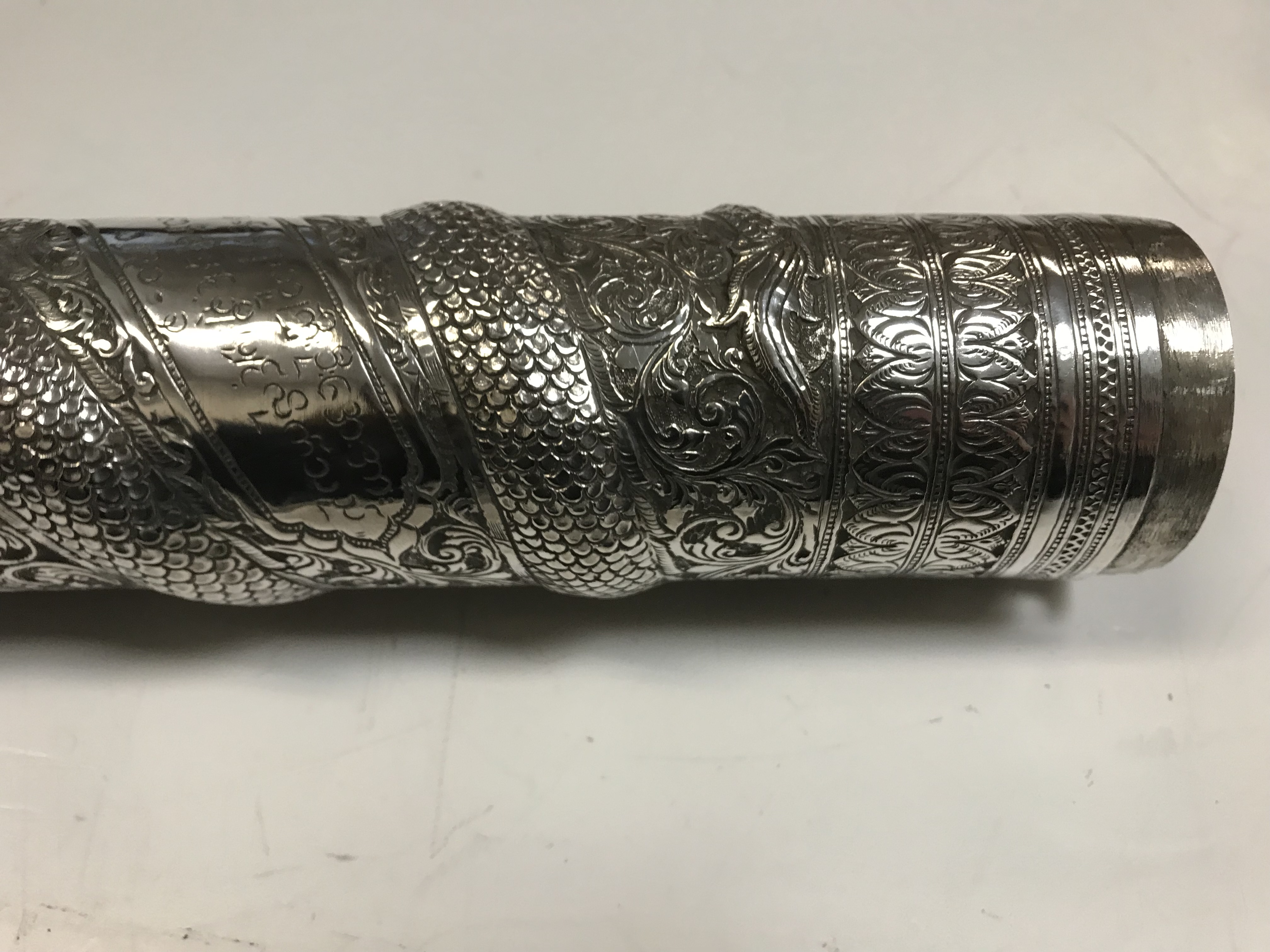 A Burmese silver document or manuscript holder with foliate and relief work serpent decoration and - Image 8 of 21